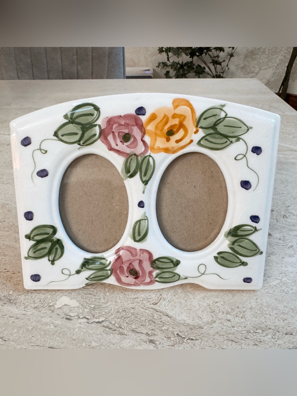 Vintage ceramic painted picture frame.